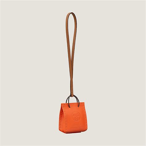 hermes orange bag charm price|hermes twilly on bag.